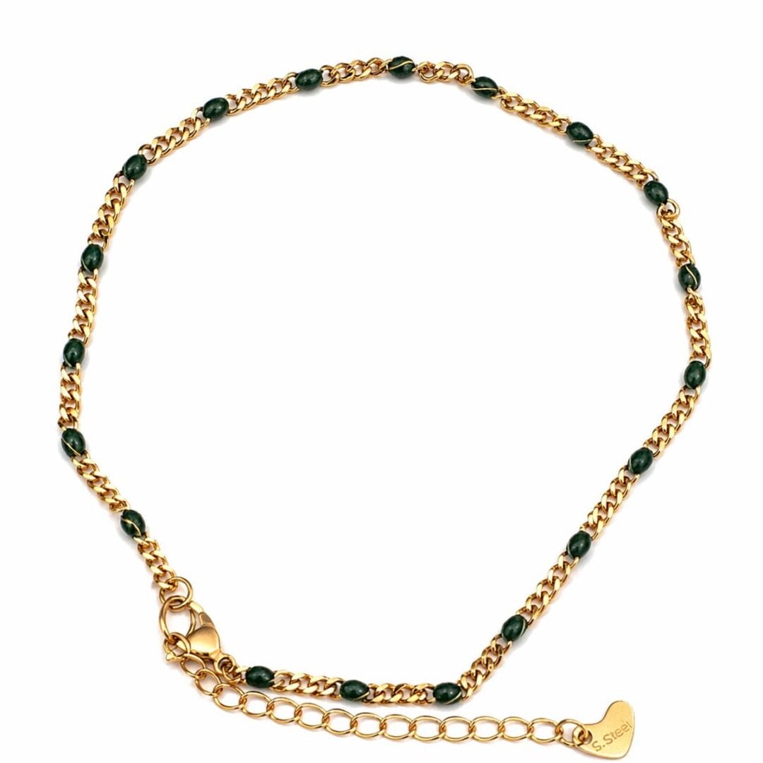 Fussketteli Green von Elyn & Sol — goldene Kette mit schwarzen Perlen und Säckli