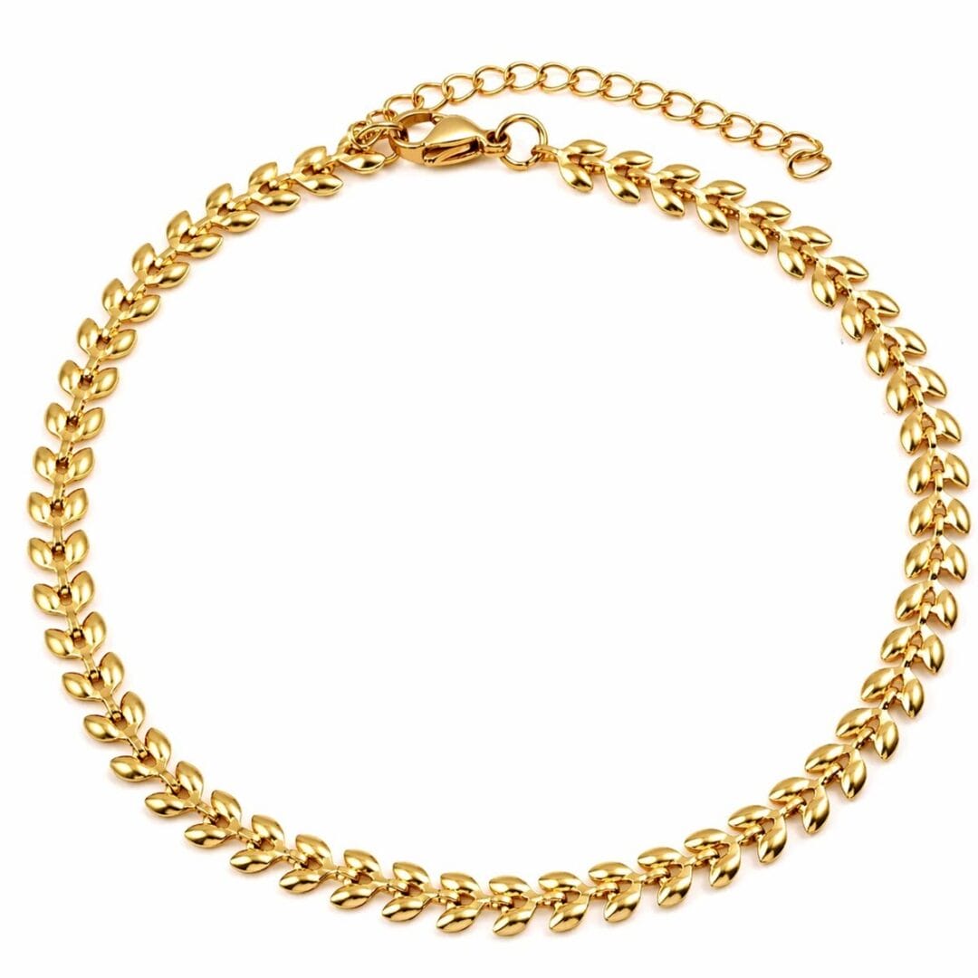 Fussketteli Leaves von Elyn & Sol — goldene Blattkette mit Säckli